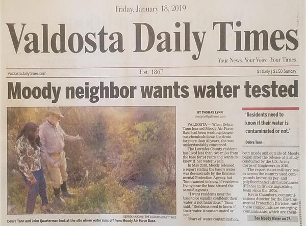 [Debra Tann and John Quarterman look at the site where water runs off from Moody Air Force Base. Photo: Derrek Vaughn, The Valdosta Daily Times. 2019-01-18]